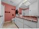Bathroom featuring a glass bowl sink with stylish fixtures, a spacious countertop, and tiled floors at 2030 Se 32Nd Ln, Ocala, FL 34471