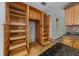 Spacious kitchen with beautiful wood cabinets and granite countertops, offering ample storage space at 2030 Se 32Nd Ln, Ocala, FL 34471