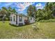 Spacious backyard featuring a lawn and outdoor seating at 21776 Nw 57Th Ave, Micanopy, FL 32667