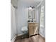 Bathroom featuring a shower, single vanity, and modern lighting at 21776 Nw 57Th Ave, Micanopy, FL 32667