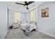 Cozy bedroom with soft lighting, comfortable bedding, and a calming color scheme at 21776 Nw 57Th Ave, Micanopy, FL 32667