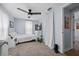 Bedroom with carpet flooring, ceiling fan, and comfortable lighting at 21776 Nw 57Th Ave, Micanopy, FL 32667