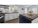 Well-lit kitchen featuring white cabinets, butcher block countertops, and modern appliances at 21776 Nw 57Th Ave, Micanopy, FL 32667