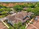 Aerial view of complex showcasing community amenities, landscaping, and building exteriors at 2950 Lucayan Harbour Cir # 107, Kissimmee, FL 34746