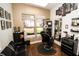 A cozy barber shop featuring barber's chair, mirrors, and stylish decor at 2950 Lucayan Harbour Cir # 107, Kissimmee, FL 34746