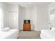 Bright bedroom features two beds, a ceiling fan, and neutral carpeting at 2950 Lucayan Harbour Cir # 107, Kissimmee, FL 34746