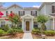 Charming townhome with a well-maintained lawn and a walkway leading to the front door at 2950 Lucayan Harbour Cir # 107, Kissimmee, FL 34746
