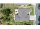 Aerial view showcases this home's roof, landscaping, and neighborhood surroundings at 7274 Sw 95Th Ave, Ocala, FL 34481