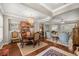 Elegant dining room featuring a chandelier, hardwood floors, and ornate furnishings at 7274 Sw 95Th Ave, Ocala, FL 34481