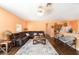 Comfortable living room with hardwood floors, and ample seating at 2648 Ne 24Th Pl, Ocala, FL 34470