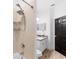 Bright bathroom with a tiled shower and modern sink at 23510 Oak Prairie Cir, Sorrento, FL 32776