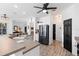 Bright open kitchen with solid surface countertops, stainless steel appliances, and wood-look floors at 23510 Oak Prairie Cir, Sorrento, FL 32776