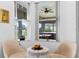 Sitting area with a view of the screened-in porch at 23510 Oak Prairie Cir, Sorrento, FL 32776