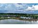 A lakeside community with a clubhouse and pool at 5237 Nw 48Th Pl, Ocala, FL 34482