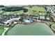 Stunning aerial view of the community amenities, including the pool, tennis courts, and golf course at 5237 Nw 48Th Pl, Ocala, FL 34482