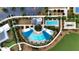 Aerial community shot of pools, parking, tennis and recreation areas in a neighborhood at 5237 Nw 48Th Pl, Ocala, FL 34482