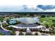 Aerial view of the clubhouse, pool and lake located in Ocala Preserve at 5237 Nw 48Th Pl, Ocala, FL 34482