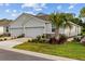 Attractive home with neutral exterior, well maintained landscaping and dual garage at 5237 Nw 48Th Pl, Ocala, FL 34482