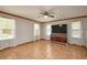 Living room featuring neutral walls, tile flooring, and a television at 3005 Se 156Th Place Rd, Summerfield, FL 34491