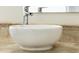 Close-up of elegant white basin sink with chrome faucet and beautiful tile at 1157 Hollow Pine Dr, Oviedo, FL 32765