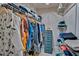 Walk-in closet boasts ample storage space with hanging racks and shelving for organized clothing at 20250 Nw 71St Ct, Micanopy, FL 32667