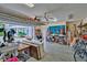 Spacious garage with tools, bicycles, and room for multiple vehicles at 20250 Nw 71St Ct, Micanopy, FL 32667