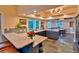Modern kitchen with stainless steel appliances, spacious countertops, and ample storage at 20250 Nw 71St Ct, Micanopy, FL 32667