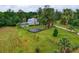 Aerial view of home with large yard and landscaping at 20250 Nw 71St Ct, Micanopy, FL 32667