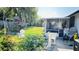 This backyard has a playset and a covered patio at 251 Celery Cir, Oviedo, FL 32765