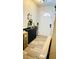 Foyer showcasing wood-look flooring, stylish decor, and bright, welcoming ambiance at 251 Celery Cir, Oviedo, FL 32765