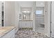 Spacious bathroom with double vanity sink and walk in shower at 17781 Sw 72Nd Street Rd, Dunnellon, FL 34432