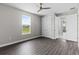 Inviting bedroom with a large window and ensuite bathroom entrance at 17781 Sw 72Nd Street Rd, Dunnellon, FL 34432