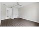 This bedroom features neutral walls, wood floors, and double door closet at 17781 Sw 72Nd Street Rd, Dunnellon, FL 34432