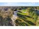 Scenic view of the meticulously maintained golf course with lush green fairways and mature trees at 17781 Sw 72Nd Street Rd, Dunnellon, FL 34432