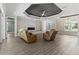 Bright living room featuring recessed lighting, electric fireplace, neutral walls and wood flooring throughout at 17781 Sw 72Nd Street Rd, Dunnellon, FL 34432