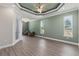 Spacious living room area featuring wood floors and comfortable armchairs at 17781 Sw 72Nd Street Rd, Dunnellon, FL 34432