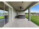 A covered patio perfect for outdoor relaxation, featuring a spa at 17887 Sw 72Nd Street Rd, Dunnellon, FL 34432