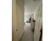 View into a carpeted bedroom with an exterior view and white dressers at 3875 Shaftbury Pl, Oviedo, FL 32765