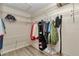 This closet features shelving and hanging rods, offering organized storage and wood-look floors at 3968 Sw 131St Place Rd, Ocala, FL 34473