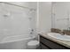 Cozy bathroom features a shower-tub combination and a granite vanity at 4261 Sw 62Nd Loop, Ocala, FL 34474