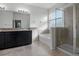 Bathroom showcases granite countertop vanity, tub, and tiled glass door shower at 4261 Sw 62Nd Loop, Ocala, FL 34474