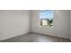This bedroom features hard surface floors, bright window and light walls at 4261 Sw 62Nd Loop, Ocala, FL 34474