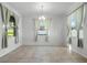 Bright dining room with tile flooring and large windows that offer plenty of natural light at 4261 Sw 62Nd Loop, Ocala, FL 34474