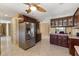 Spacious kitchen featuring stainless steel appliances and rich, dark wood cabinetry at 2135 Se 12Th St, Ocala, FL 34471