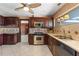 Stylish kitchen featuring stainless steel appliances, quartz countertops, and tile backsplash at 2135 Se 12Th St, Ocala, FL 34471