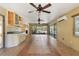 Enclosed lanai with tiled floors and ceiling fans provides a great view of the pool at 2135 Se 12Th St, Ocala, FL 34471