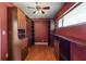 Large walk-in closet with custom built-ins, hardwood floors, and a window at 2135 Se 12Th St, Ocala, FL 34471