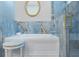 Luxurious bathroom with soaking tub, marble accents, modern fixtures, and plenty of natural light at 3943 Nw 219Th Street Rd, Micanopy, FL 32667