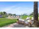 Outdoor living area on the patio with water view featuring outdoor furniture and paver patio at 3943 Nw 219Th Street Rd, Micanopy, FL 32667