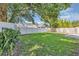 Backyard features a well-maintained yard with privacy fence at 716 Golfview St, Orlando, FL 32804